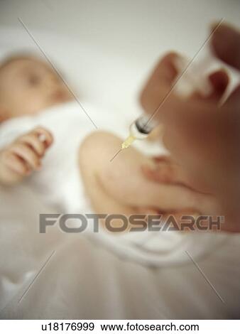 Childhood injection View Large Photo Image Stock Photo - Childhood injection. Fotosearch