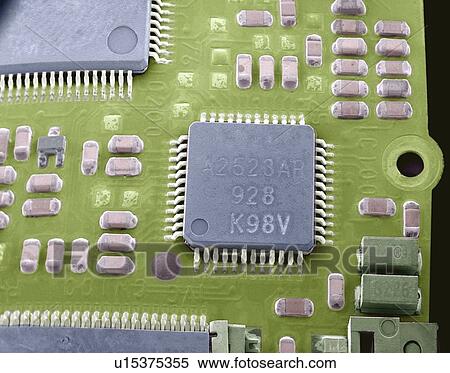 Stock Photography - Circuit board microchip, SEM. Fotosearch