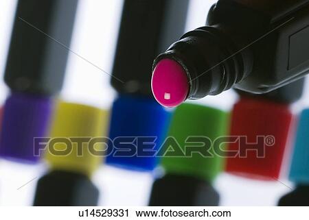 Coloured paint in a bottle View Large Photo Image Stock Image - Coloured paint in a bottle. Fotosearch