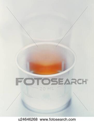 Cup of medicine View Large Photo Image Stock Photo - Cup of medicine. Fotosearch