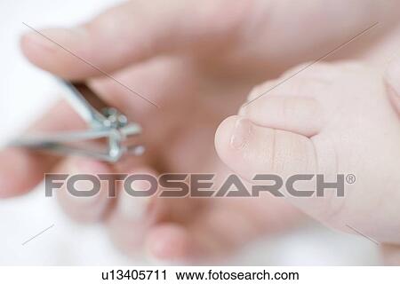 Cutting toenails View Large Photo Image Stock Image - Cutting toenails. Fotosearch