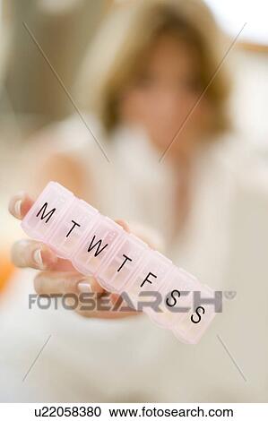 Stock Image - Daily pill container. Fotosearch