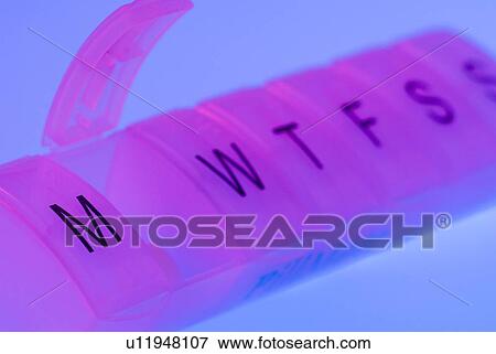 Daily pill container View Large Photo Image Stock Photo - Daily pill container. Fotosearch