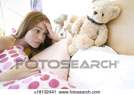 Stock Image - Depressed teenage girl. Fotosearch
