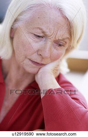 Stock Image - Depressed woman. Fotosearch