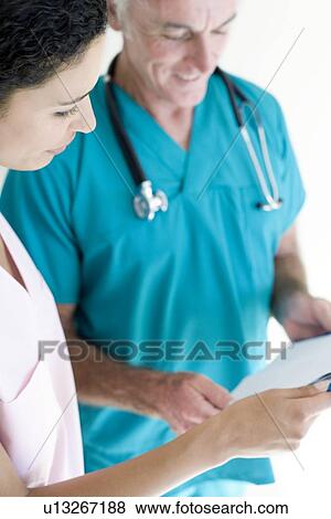 Doctor and nurse View Large Photo Image Stock Photo - Doctor and nurse. Fotosearch