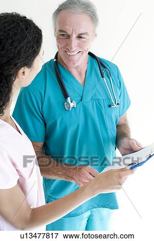 Doctor and nurse View Large Photo Image Stock Photo - Doctor and nurse. Fotosearch