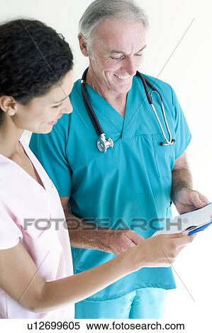 Stock Photography - Doctor and nurse. Fotosearch