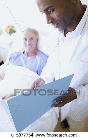 Picture - Doctor and patient. Fotosearch