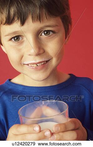 Stock Photo - Drinking milk. Fotosearch