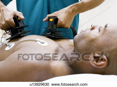 Emergency defibrillation View Large Photo Image Stock Image - Emergency defibrillation. Fotosearch