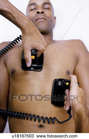 Emergency defibrillation View Large Photo Image Stock Image - Emergency defibrillation. Fotosearch
