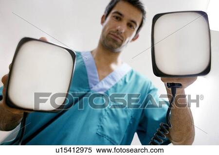 Emergency defibrillation View Large Photo Image Stock Photography - Emergency defibrillation. Fotosearch