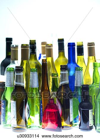Picture - Empty wine and beer bottles. Fotosearch