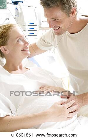 Stock Image - Expectant parents. Fotosearch