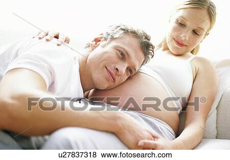 Stock Photo - Expectant parents. Fotosearch