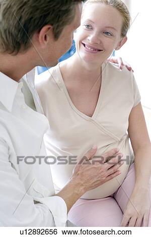 Stock Photograph - Expectant parents. Fotosearch