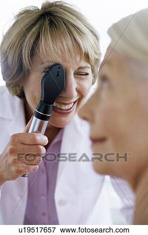 Stock Photo - Eye examination. Fotosearch