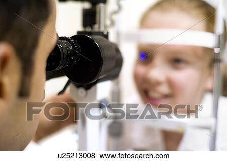 Eye examination View Large Photo Image Stock Photo - Eye examination. Fotosearch