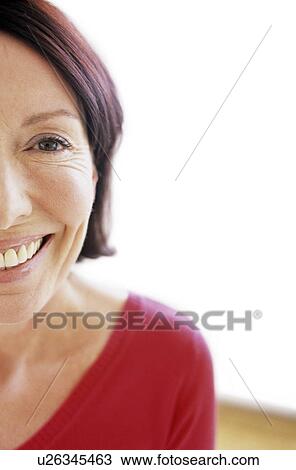 Stock Image - Face of a smiling woman. Fotosearch