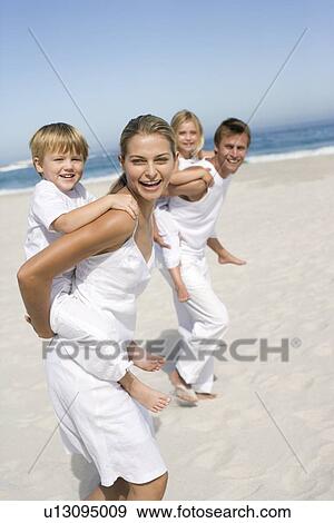 Family on holiday View Large Photo Image Stock Photo - Family on holiday. Fotosearch