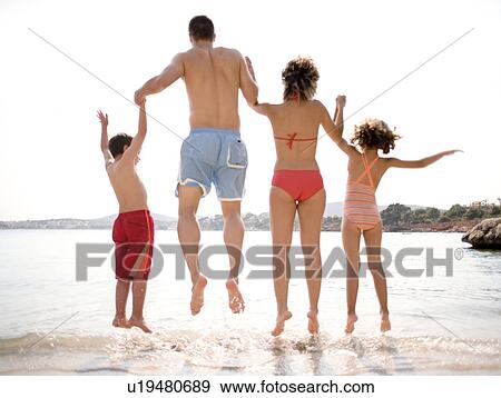 Family on holiday View Large Photo Image Stock Photo - Family on holiday. Fotosearch