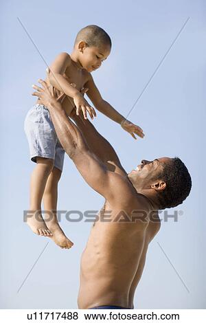Father and son View Large Photo Image Stock Photo - Father and son. Fotosearch
