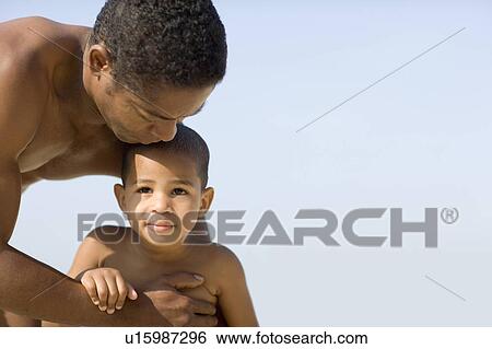 Stock Photograph - Father and son. Fotosearch