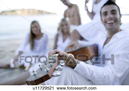 Stock Image - Friends relaxing. Fotosearch