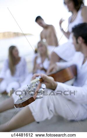 Friends relaxing View Large Photo Image Stock Image - Friends relaxing. Fotosearch