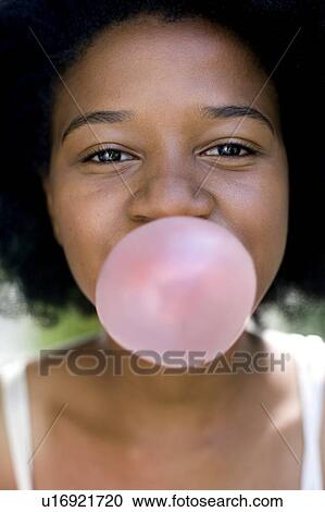 Girl blowing bubblegum View Large Photo Image Stock Image - Girl blowing bubblegum. Fotosearch