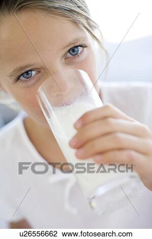 Girl drinking milk View Large Photo Image Stock Image - Girl drinking milk. Fotosearch