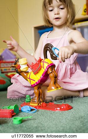 Stock Photography - Girl playing. Fotosearch