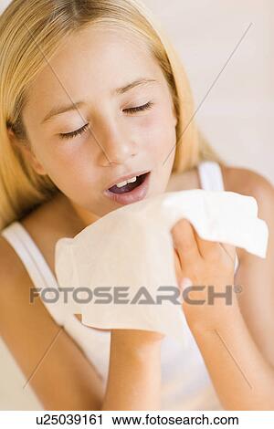 Girl sneezing View Large Photo Image Stock Image - Girl sneezing. Fotosearch