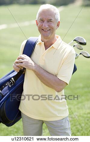 Stock Image - Golf player. Fotosearch