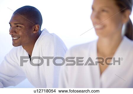 Happy couple relaxing at a spa View Large Photo Image Picture - Happy couple relaxing at a spa. Fotosearch