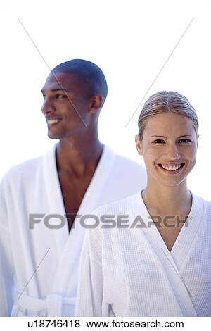 Happy couple relaxing at a spa View Large Photo Image Stock Photo - Happy couple relaxing at a spa. Fotosearch