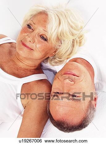 Stock Photograph - Happy elderly couple. Fotosearch