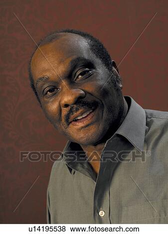 Happy elderly man View Large Photo Image Stock Photo - Happy elderly man. Fotosearch