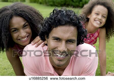 Stock Photograph - Happy family. Fotosearch