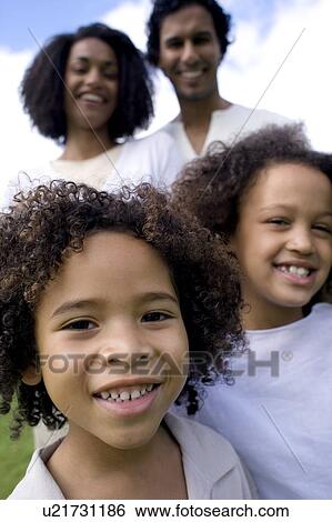 Stock Photograph - Happy family. Fotosearch