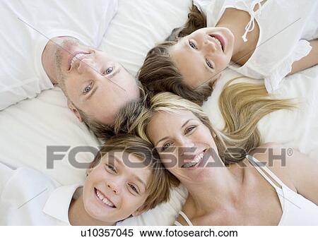Stock Photography - Happy family. Fotosearch