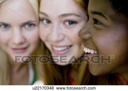 Stock Photo - Happy teenage girls. Fotosearch