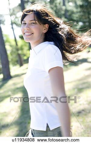 Happy woman outdoors View Large Photo Image Stock Photo - Happy woman outdoors. Fotosearch