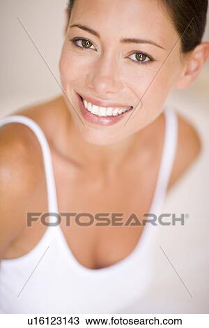Stock Image - Happy woman. Fotosearch