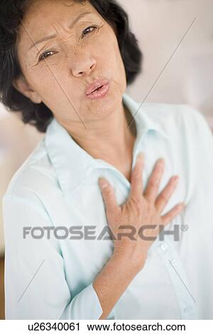 Stock Image - Heartburn. Fotosearch