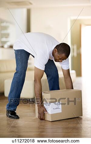Heavy lifting View Large Photo Image Stock Photo - Heavy lifting. Fotosearch