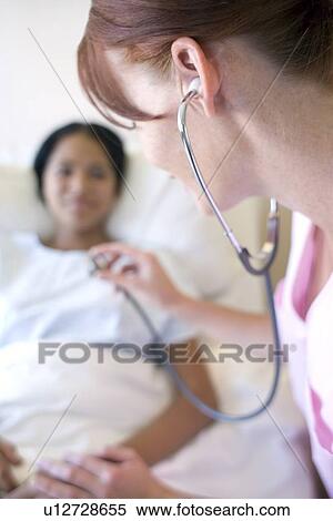Stock Photography - Hospital examination. Fotosearch