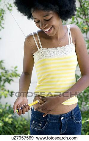 Stock Photo - Insulin injection. Fotosearch
