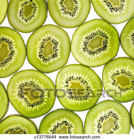 Kiwi slices View Large Photo Image Picture - Kiwi slices. Fotosearch